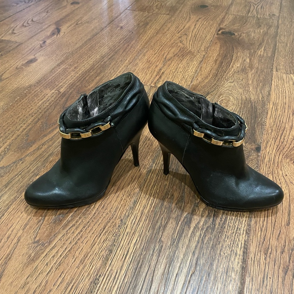 Calvin Klein Black and Gold Ankle Booties